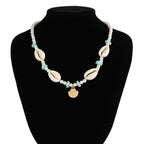 שרשרת פנינים בשילוב צדפים